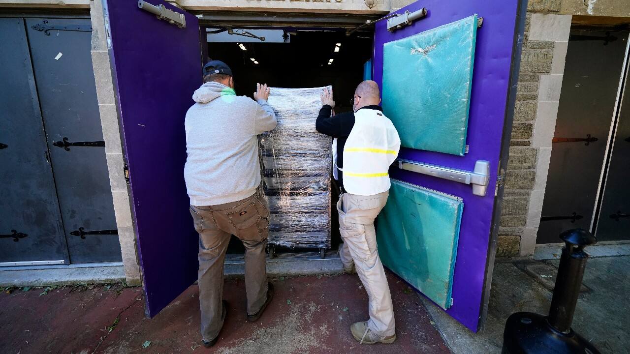 Chester County, Pa., workers transport mail-in and absentee ballots to be processed at West Chester University in West Chester. (Image: AP/Matt Slocum)