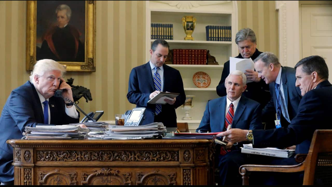 U.S. President Donald Trump (L-R), joined by Chief of Staff Reince Priebus, Vice President Mike Pence, senior advisor Steve Bannon, Communications Director Sean Spicer and National Security Advisor Michael Flynn, speaks by phone with Russia's President Vladimir Putin in the Oval Office at the White House in Washington, U.S. January 28, 2017. (Image: Reuters) U.S. President Donald Trump (L-R), joined by Chief of Staff Reince Priebus, Vice President Mike Pence, senior advisor Steve Bannon, Communications Director Sean Spicer and National Security Advisor Michael Flynn, speaks by phone with Russia's President Vladimir Putin in the Oval Office at the White House in Washington, U.S. January 28, 2017. (Image: Reuters)