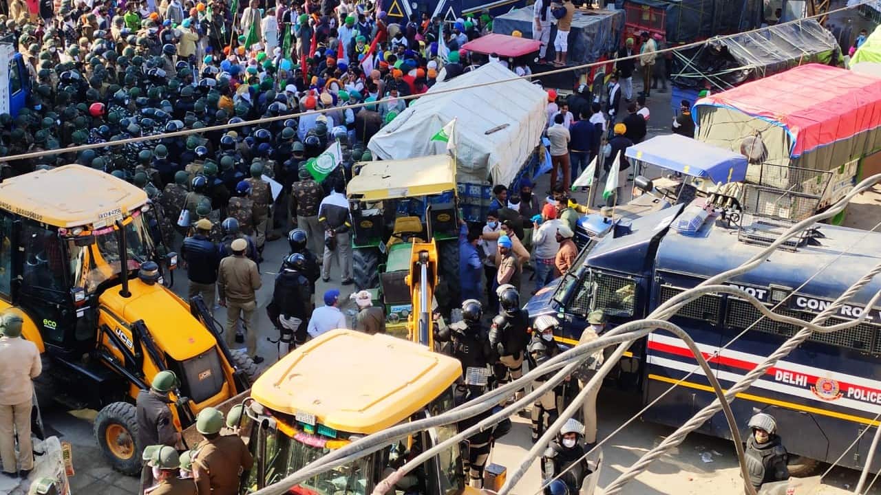 Thousands of farmers, protesting against the Centre's agriculture laws, have arrived at Delhi borders after breaking police barricades in Haryana. Farmers, who are marching to Delhi from Punjab as part of their &quot;Chalo dilli&quot; protest, braved tear gas shells and water cannons to break through police barricades at several places at the Punjab-Haryana border on November 26. (Image: News18)