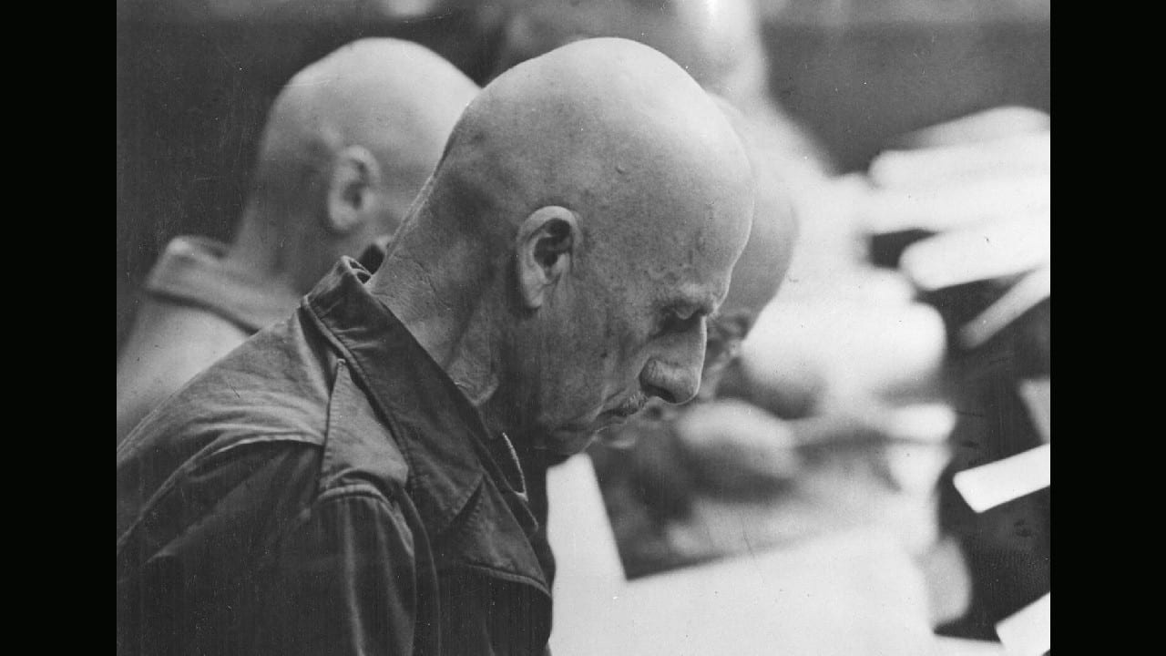 German Fieldmarshal Wilhelm Leeb, is pictured during the Nuremberg Trials, Case 12, as he reads the letter of accusations against himself and other high ranking German officers during WW II, in the courthouse in Nuremberg, Germany, November 11, 1947. (Image: AP) German Fieldmarshal Wilhelm Leeb, is pictured during the Nuremberg Trials, Case 12, as he reads the letter of accusations against himself and other high ranking German officers during WW II, in the courthouse in Nuremberg, Germany, November 11, 1947. (Image: AP)
