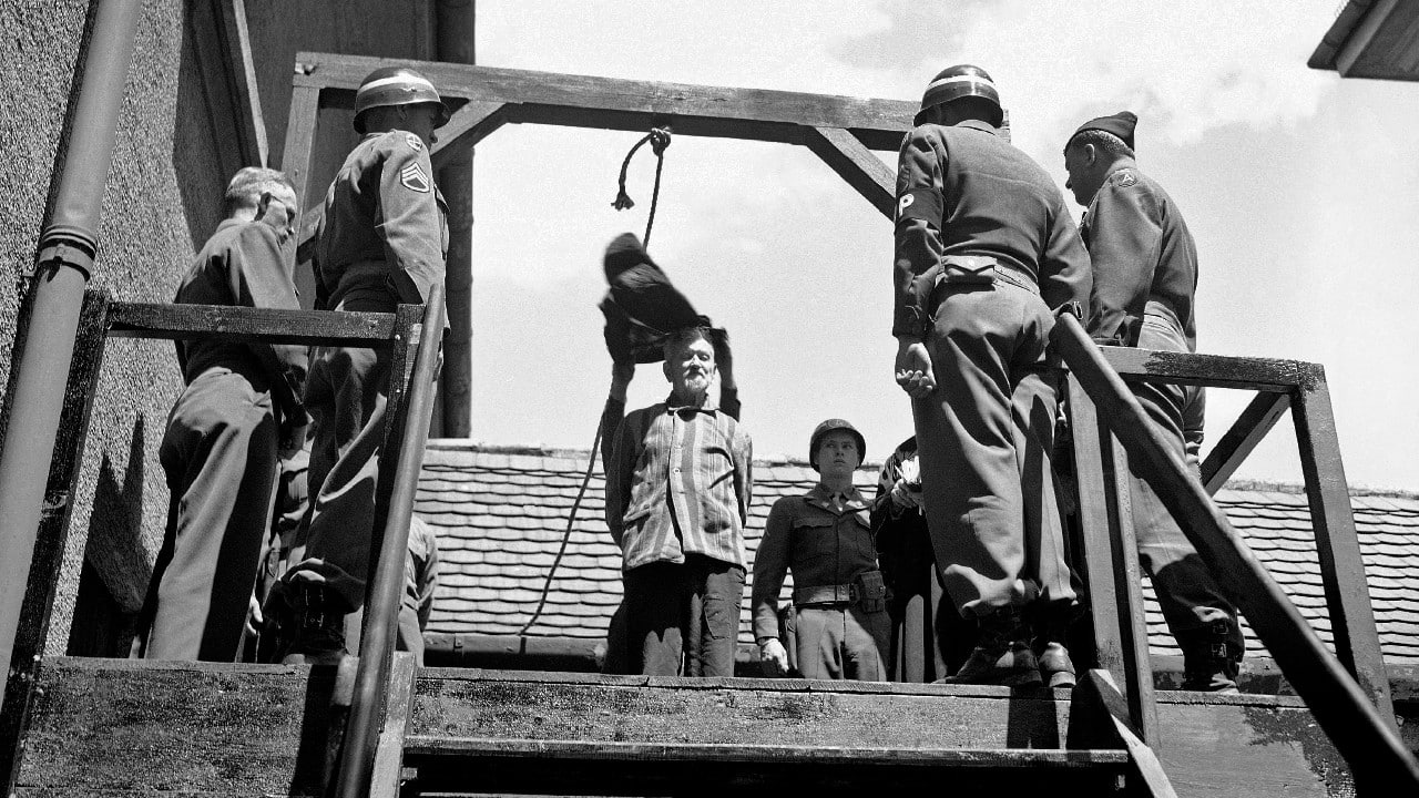 US military authorities prepare to hang Dr. Klaus Karl Schilling, 74, at Landsberg, Germany on May 28, 1946. In a Dachau war crimes trial he was convicted of using 1,200 concentration camp prisoners for malaria experimentation. Thirty died directly from the inoculations and 300 to 400 died later from complications of the disease. His experiments all with unwilling subjects began in 1942. (Image: AP) US military authorities prepare to hang Dr. Klaus Karl Schilling, 74, at Landsberg, Germany on May 28, 1946. In a Dachau war crimes trial he was convicted of using 1,200 concentration camp prisoners for malaria experimentation. Thirty died directly from the inoculations and 300 to 400 died later from complications of the disease. His experiments all with unwilling subjects began in 1942. (Image: AP)