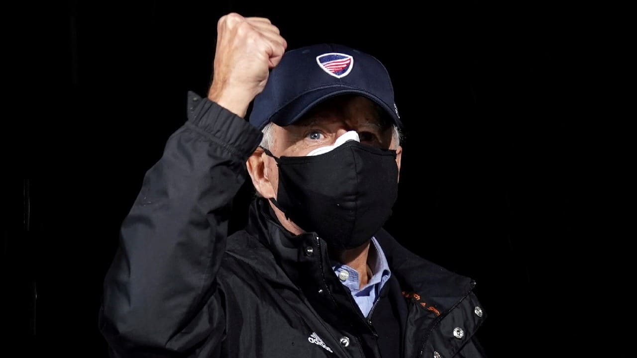 U.S. Democratic presidential candidate Joe Biden gestures during a drive-in campaign rally in Philadelphia, Pennsylvania, U.S., November 1. (Image: Reuters)