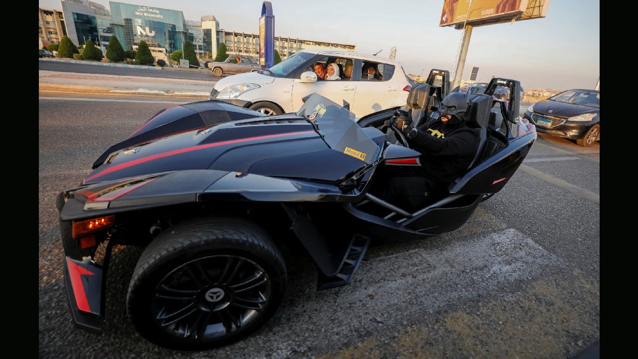 As the world gear up for Christmas, many countries have introduced strict restrictions for the celebration amid the ongoing coronavirus pandemic. While everyone is following the safety measures to keep themselves and their loved ones safe from the novel outbreak a man in Egypt is doing his bit to fight against the COVID-19. 28-year-old Bassem Raaof, dressed in a Batman costume, is handing out face masks to residents in his neighbourhood during Christmas season, amid the coronavirus pandemic in Egypt. (Image: Reuters) As the world gear up for Christmas, many countries have introduced strict restrictions for the celebration amid the ongoing coronavirus pandemic. While everyone is following the safety measures to keep themselves and their loved ones safe from the novel outbreak a man in Egypt is doing his bit to fight against the COVID-19. 28-year-old Bassem Raaof, dressed in a Batman costume, is handing out face masks to residents in his neighbourhood during Christmas season, amid the coronavirus pandemic in Egypt. (Image: Reuters)