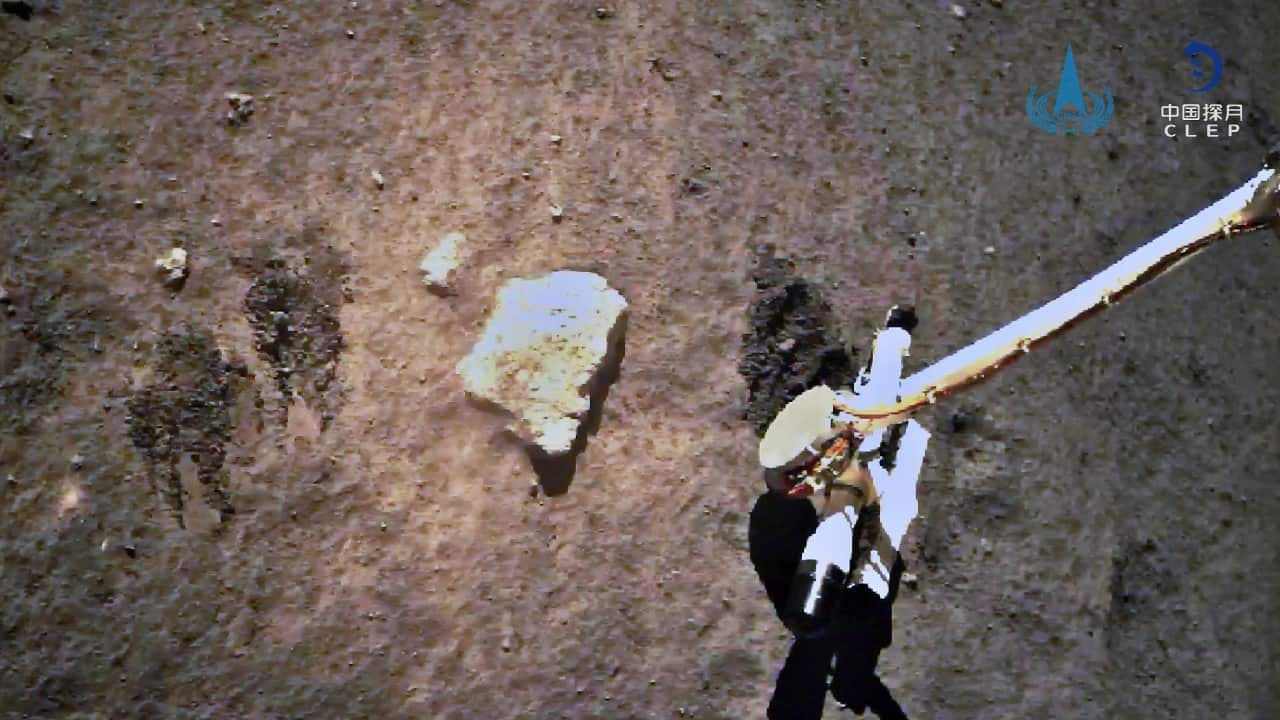 A capsule carrying the rock samples is due to land in China’s northern grasslands in the Inner Mongolia region in mid-December. They will be the first fresh samples of the lunar surface obtained by scientists since the Soviet Union's Luna 24 probe in 1976. The CNSA released a photo taken by the orbiter showing the ascent stage rocket approaching for a rendezvous. (Image: China National Space Administration/Xinhua via AP) A capsule carrying the rock samples is due to land in China’s northern grasslands in the Inner Mongolia region in mid-December. They will be the first fresh samples of the lunar surface obtained by scientists since the Soviet Union's Luna 24 probe in 1976. The CNSA released a photo taken by the orbiter showing the ascent stage rocket approaching for a rendezvous. (Image: China National Space Administration/Xinhua via AP)