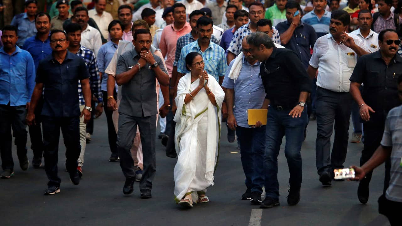 File image: West Bengal CM Mamata Banerjee greets her supporters during a 2019 protest march in Kolkata. (Reuters/Rupak De Chowdhuri)