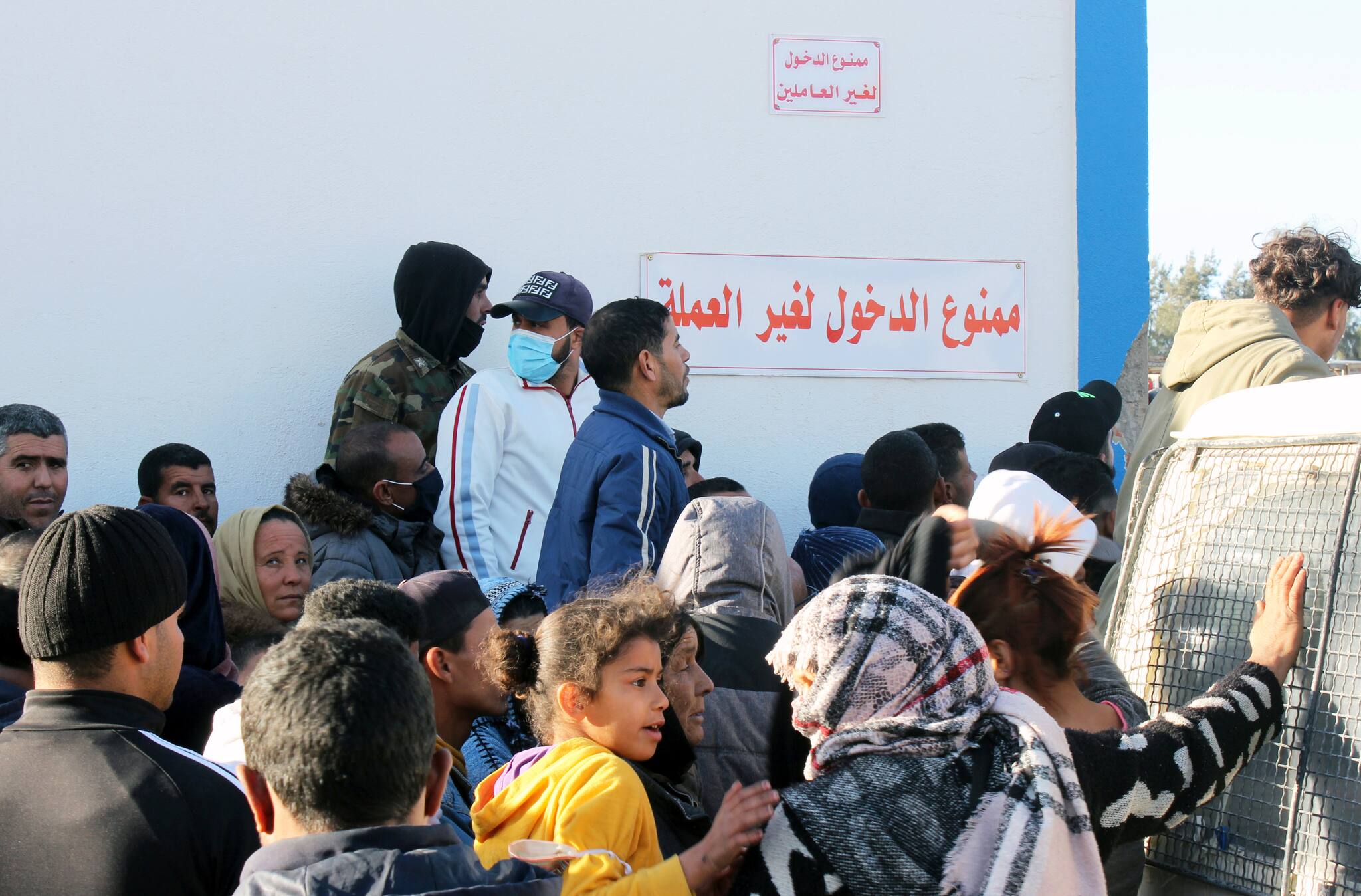 The scramble to get enough cooking gas to provide for families underlines the hardships ordinary people face in a country where the economy has stagnated, leaving the public as angry as it was a decade ago. Bigger demonstrations may take place in Tunisia on Thursday, the anniversary of Bouazizi’s self-immolation after his fruit cart was confiscated when he refused to move off an unlicensed pitch. People queue as they wait to get cooking gas outside a main outlet in Sidi Bouzid, Tunisia December 8, 2020. Picture taken December 8, 2020. REUTERS/Angus McDowall - RC2MNK98W8ZY