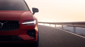 S60 R-Design, in Fusion Red metallic sedan