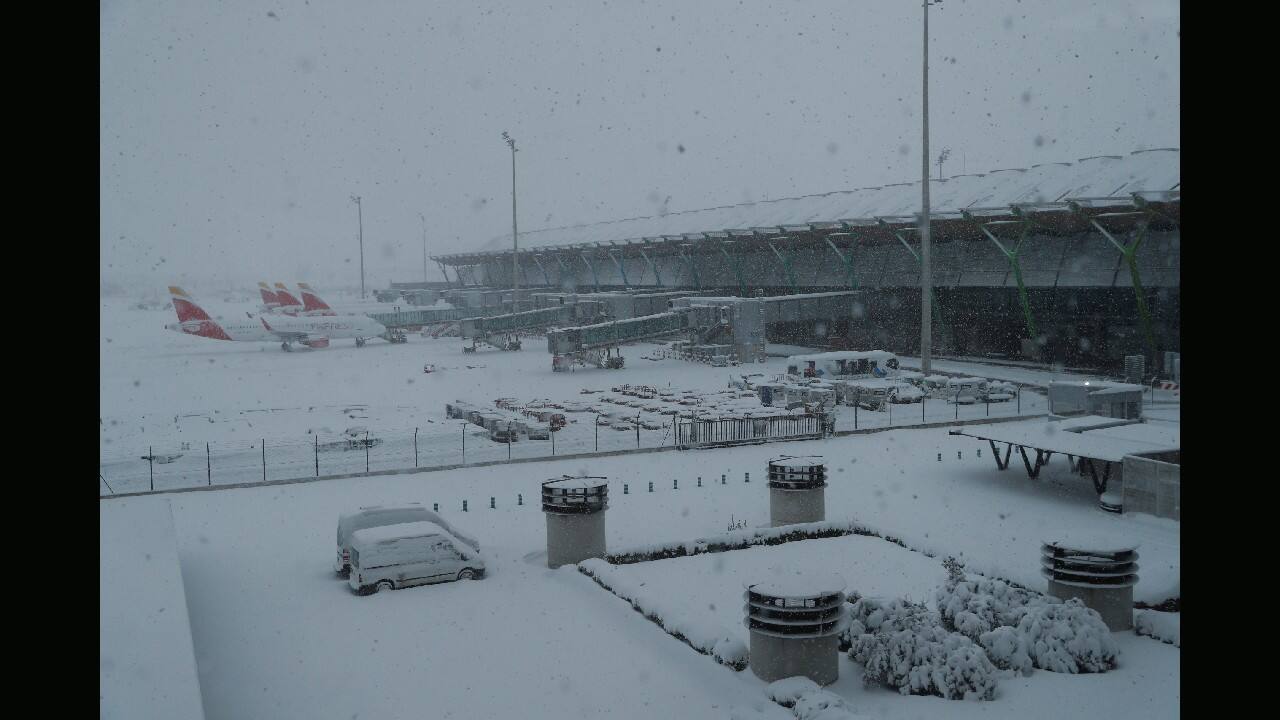 General view of parked planes at Adolfo Suarez Barajas airport, which is suspending flights due to heavy snowfall in Madrid, Spain, January 9. (Image: Reuters)