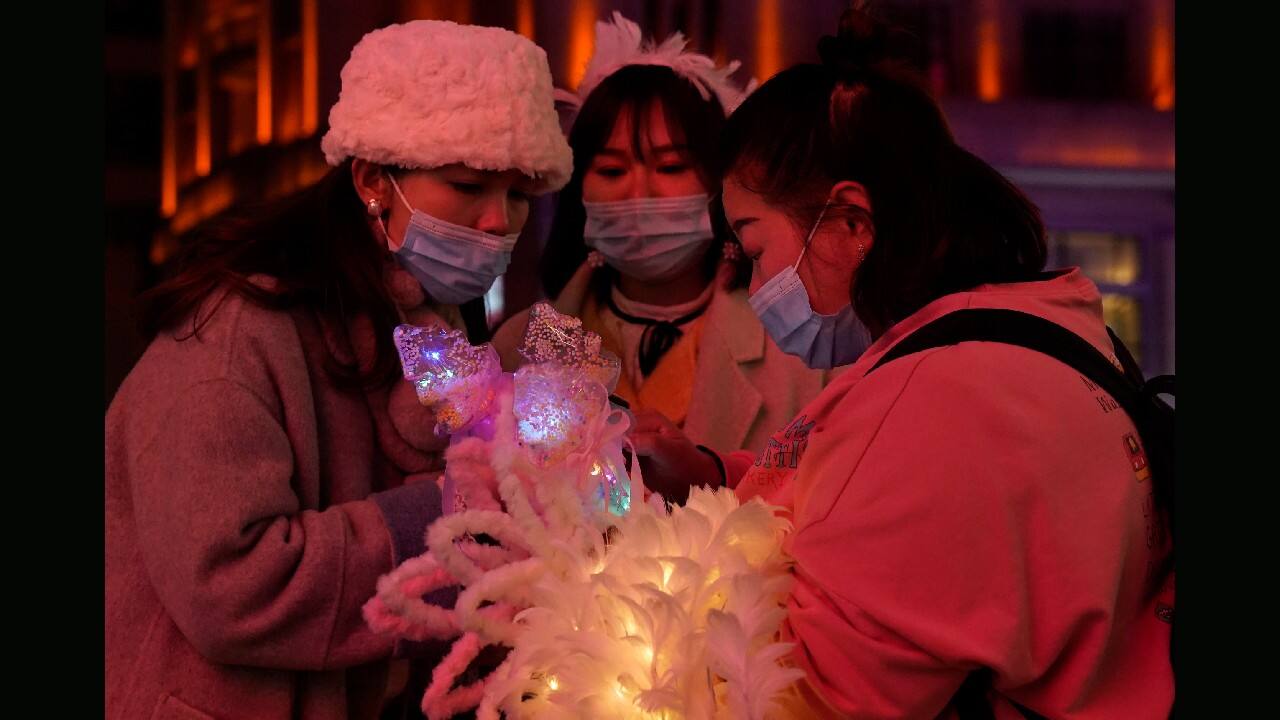 Today, some residents marvel that what was once considered the most dangerous place because of the pandemic may now be one of the safest. Bundled up against the winter cold, they walk briskly down a pedestrian-only shopping street that was a ghost town at the height of the outbreak. (Image: AP)
