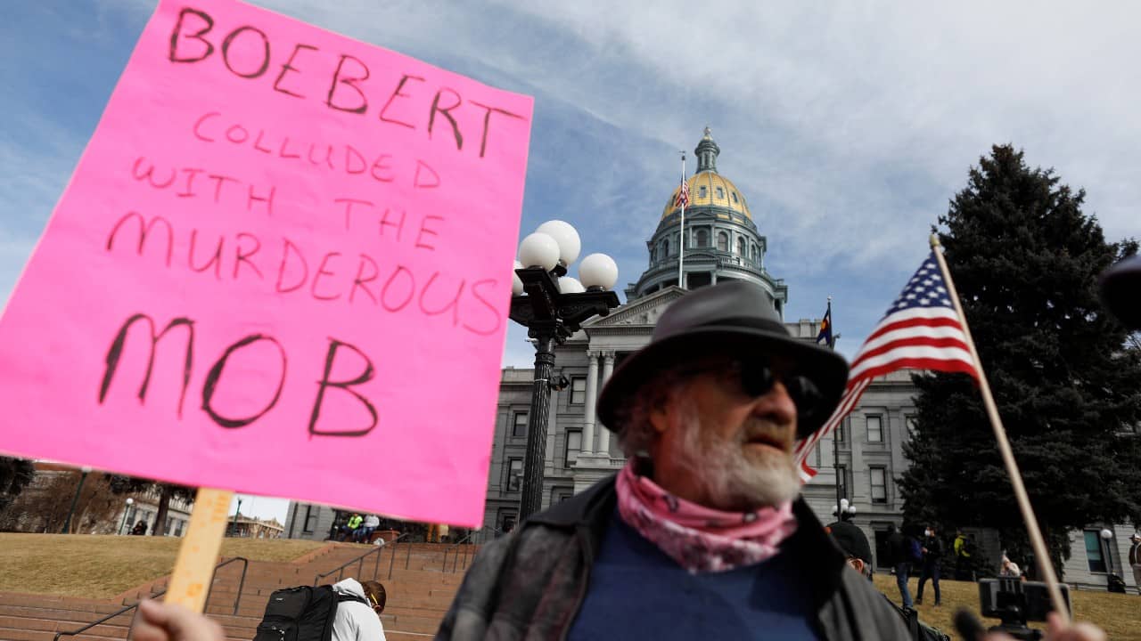 Bob Campbell holds a sign condemning US Congresswoman Lauren Boebert (R-CO) as he demonstrates against U.S. President Donald Trump days ahead of President-elect Joe Biden inauguration, outside the Colorado State Capitol in Denver, Colorado, U.S. January 17. (Image: Reuters) Bob Campbell holds a sign condemning US Congresswoman Lauren Boebert (R-CO) as he demonstrates against U.S. President Donald Trump days ahead of President-elect Joe Biden inauguration, outside the Colorado State Capitol in Denver, Colorado, U.S. January 17. (Image: Reuters)