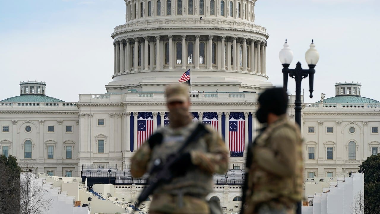 National Guard members stand guard outside the U.S. Capitol ahead of U.S. President-elect Joe Biden's inauguration, in Washington, U.S., January 17. (Image: Reuters) National Guard members stand guard outside the U.S. Capitol ahead of U.S. President-elect Joe Biden's inauguration, in Washington, U.S., January 17. (Image: Reuters)