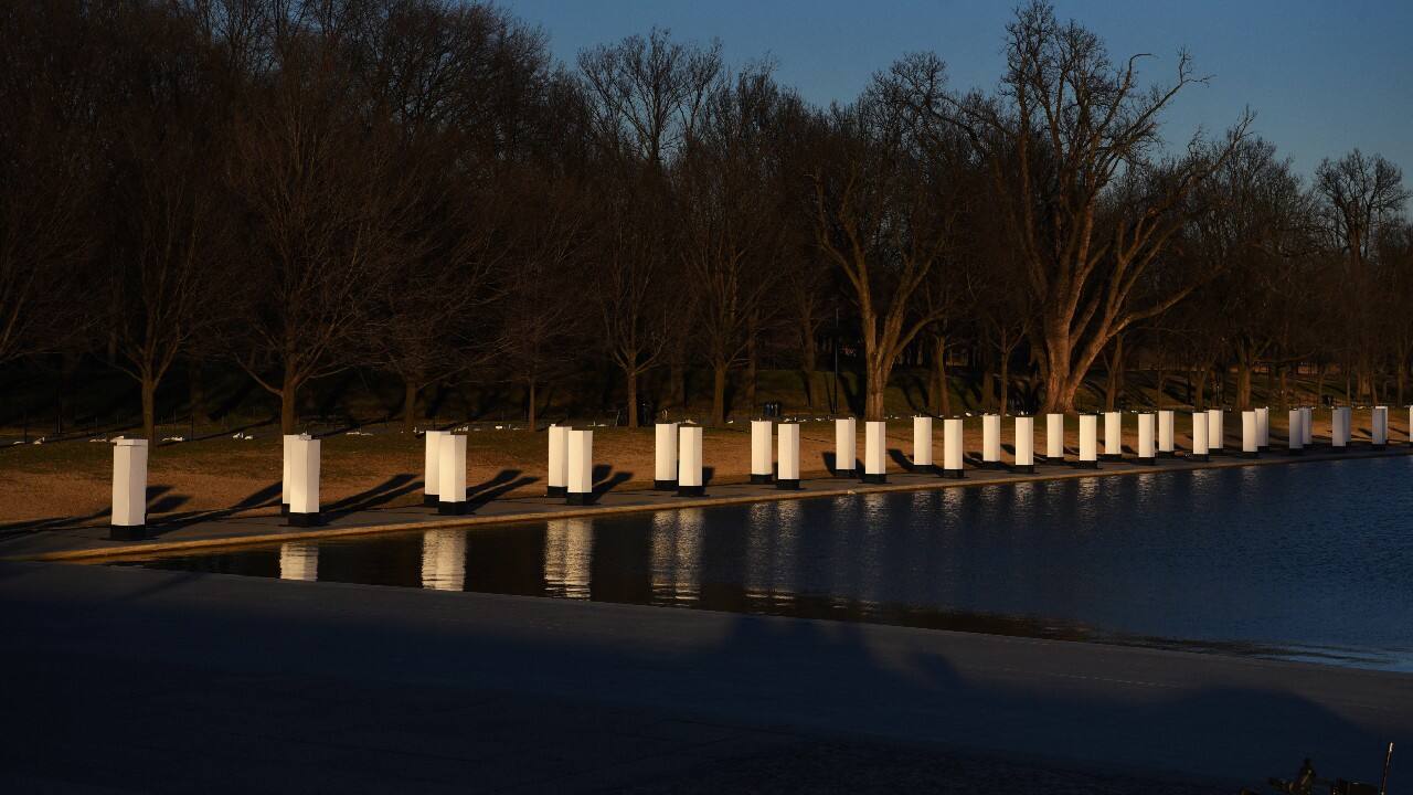President-elect Joe Biden hosts a memorial to honor those who died from coronavirus disease (COVID-19), at the reflecting pool at the Lincoln Memorial, in Washington, U.S., January 19. (Image: Reuters)