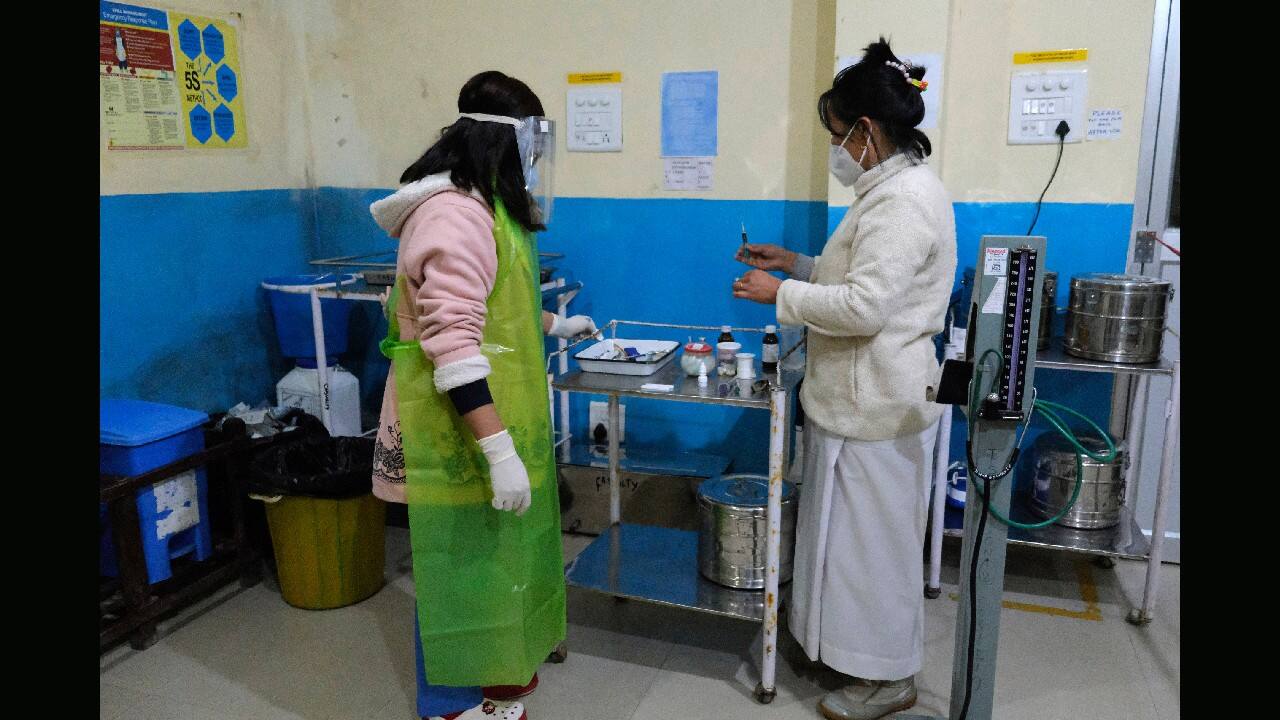 For the first three months, she couldn’t hug her three children, fearing she could potentially pass the virus to them. Her aged parents were to spend all of 2020 living with her, but it was too risky to live with a nurse so they moved back to their distant home village. And her anxiety spiked with every coronavirus test she conducted. (Image: AP)