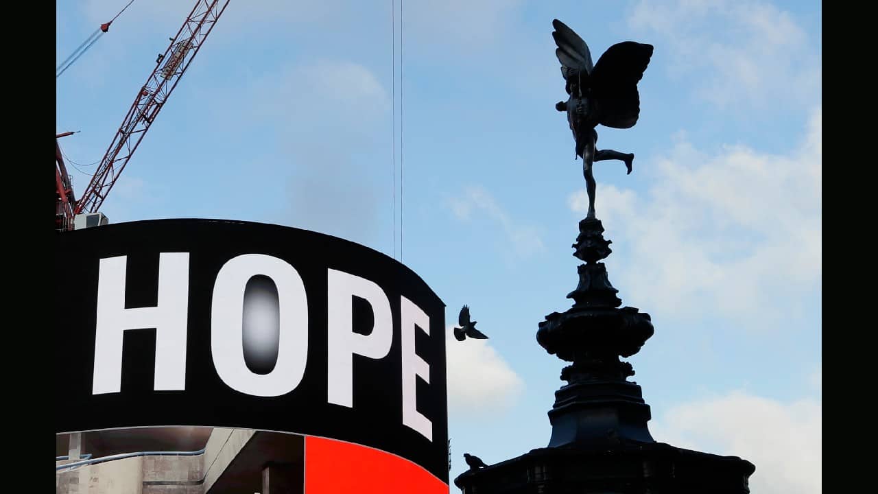 An advertisement shows the word &quot;Hope&quot; watched over by a statue of Eros, the winged Greek god of love, at Piccadilly Circus in London, January 6. Prime Minister Boris Johnson has ordered a new national lockdown for England which means people will only be able to leave their homes for limited reasons, with measures expected to stay in place until mid-February. (Image: AP/Kirsty Wigglesworth)