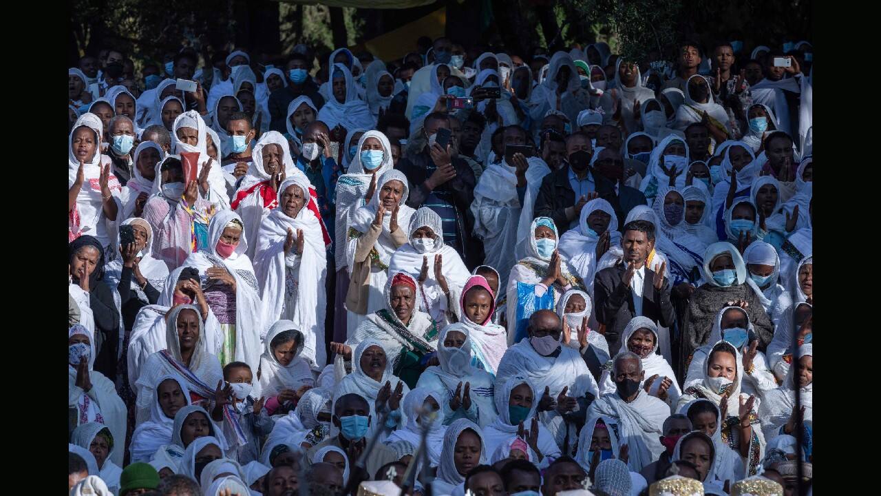Pilgrims look on during a Mass service for Ethiopian Christmas at the Bale-wold Church, in Addis Ababa, Ethiopia, January 7. (Image: AP/Mulugeta Ayene)