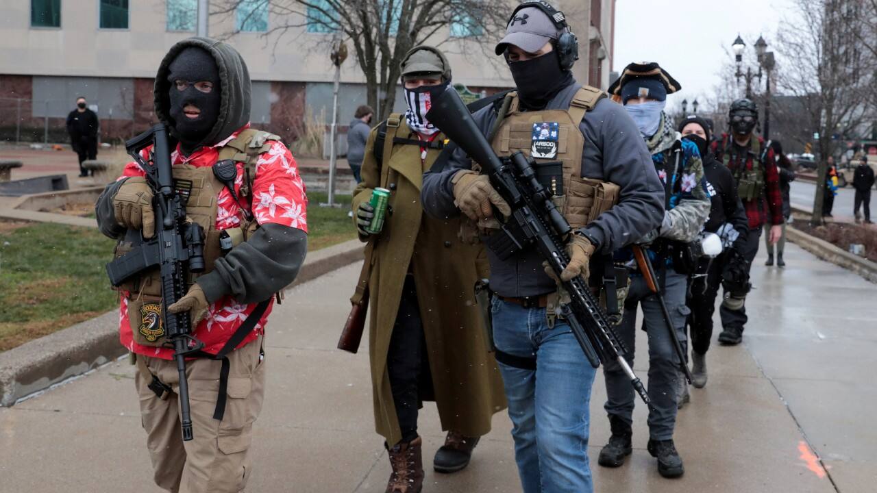 Members of the Boogaloo Bois protest against the election of President-elect Joe Biden, outside the Michigan State Capitol in Lansing, Michigan, U.S. January 17. (Image: Reuters) Members of the Boogaloo Bois protest against the election of President-elect Joe Biden, outside the Michigan State Capitol in Lansing, Michigan, U.S. January 17. (Image: Reuters)