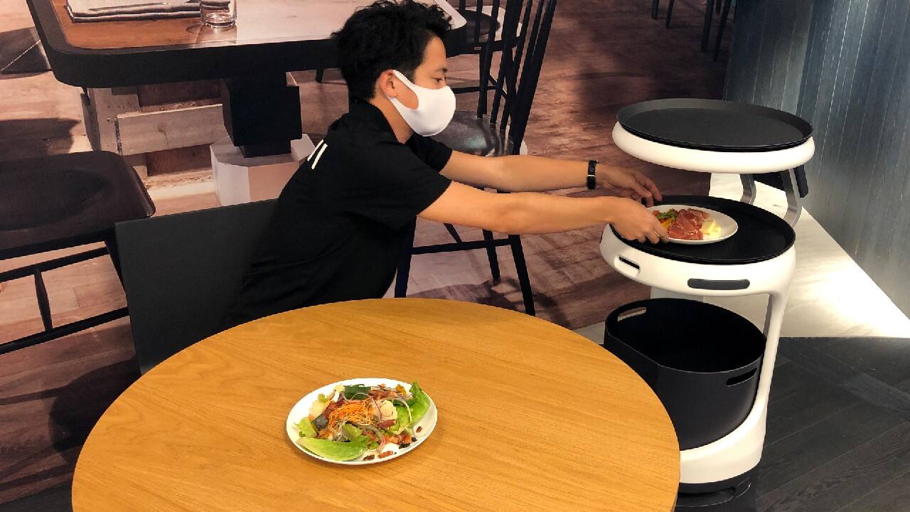 SoftBank's robotics arm demonstrates a food service robot Servi, developed by California-based Bear Robotics to Japan as restaurants grapple with labour shortages and seek to ensure social distancing during the coronavirus disease (COVID-19) outbreak, in Tokyo, Japan, September 28, 2020. (Image: Reuters)