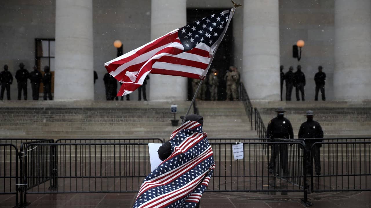 A supporter of U.S. President Donald Trump protests against the election of President-elect Joe Biden, outside the Ohio state Capitol in Columbus, U.S. January 17. (Image: Reuters) A supporter of U.S. President Donald Trump protests against the election of President-elect Joe Biden, outside the Ohio state Capitol in Columbus, U.S. January 17. (Image: Reuters)