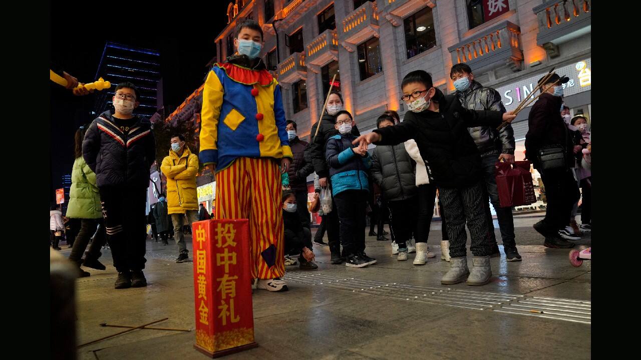 Couples go on dates, families dine out at restaurants, shoppers flock to stores. Face masks aside, people are going about their daily life pretty much as normal in the Chinese city that was first hit by the COVID-19 pandemic. (Image: AP)