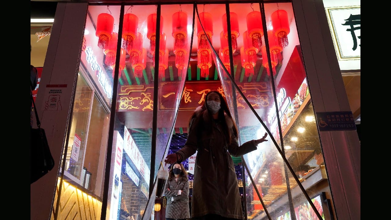 Authorities remain on guard ahead of next month’s Lunar New Year holiday, when Chinese typically return to their hometowns for family gatherings. Even a World Health Organization team, which arrived from overseas this week to investigate the origins of the virus, is being made to quarantine for 14 days. (Image: AP)