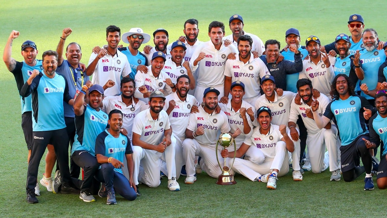 The Indian cricket team with the Border-Gavaskar trophy after defeating Australia by three wickets at the Gabba, Brisbane, Australia on January 19, 2021. (Image: AP Photo/Tertius Pickard)