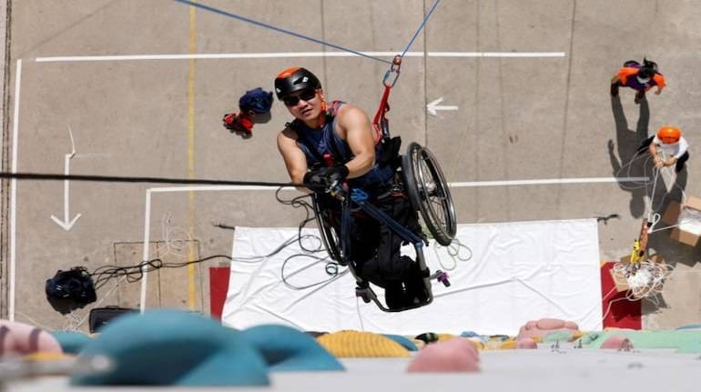In Wheelchair Paraplegic Lai Chi wai Climbs Up Skyscraper In Hong Kong in-wheelchair-paraplegic-lai-chi-wai-climbs-up-skyscraper-in-hong-kong