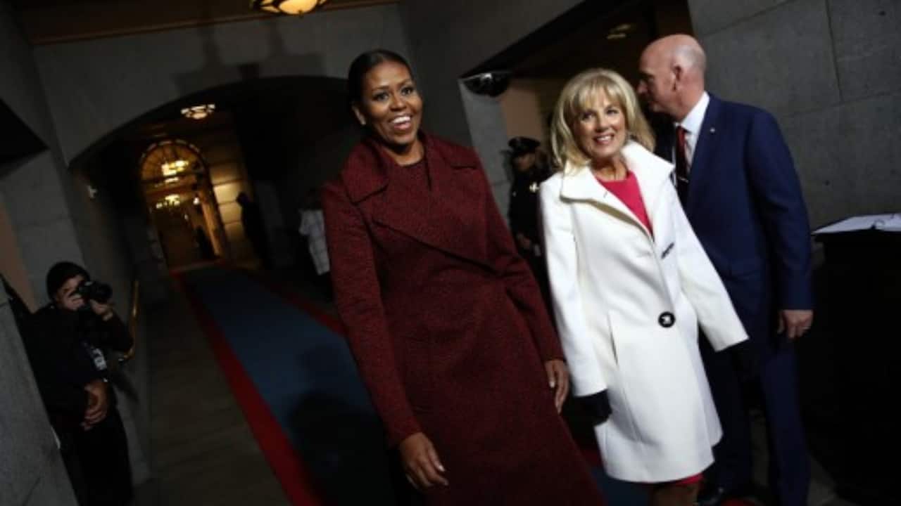 First lady Michelle Obama (L) and Jill Biden arrive on the West Front of the US Capitol on January 20, 2017 in Washington, DC. Donald Trump was sworn in as the 45th president of the United States Friday -- ushering in a new political era that has been cheered and feared in equal measure. (PC-AFP)