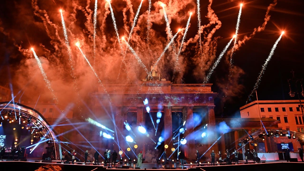 Fireworks explode over Berlin's landmark Brandenburg Gate to usher in 2021 during a 'Willkommen 2021' (Welcome 2021) concert in Berlin, Germany. (Image: John Macdougall/Pool via Reuters)