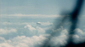 A ‘Corona’ film return capsule returns to Earth for recovery in the 1960s. Imagery from the Cold War’s Corona satellites is helping scientists fill in how we have changed our planet in the past half century. (Image: National Reconnaissance Office via The New York Times)