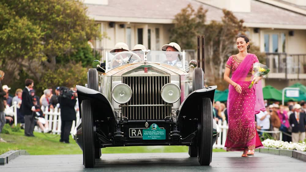 Sir Michael Kadoorie and passengers exhibit his 1925 Rolls-Royce Phantom I, built for the Maharaja of Jodhpur.