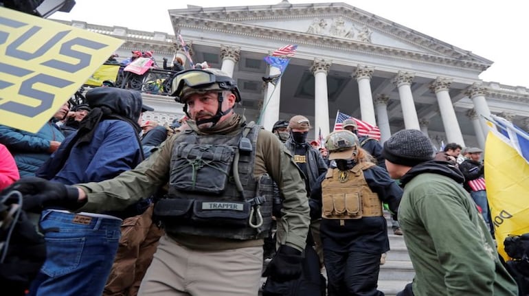 Florida man photographed carrying Speaker's lectern in Capitol riot ...