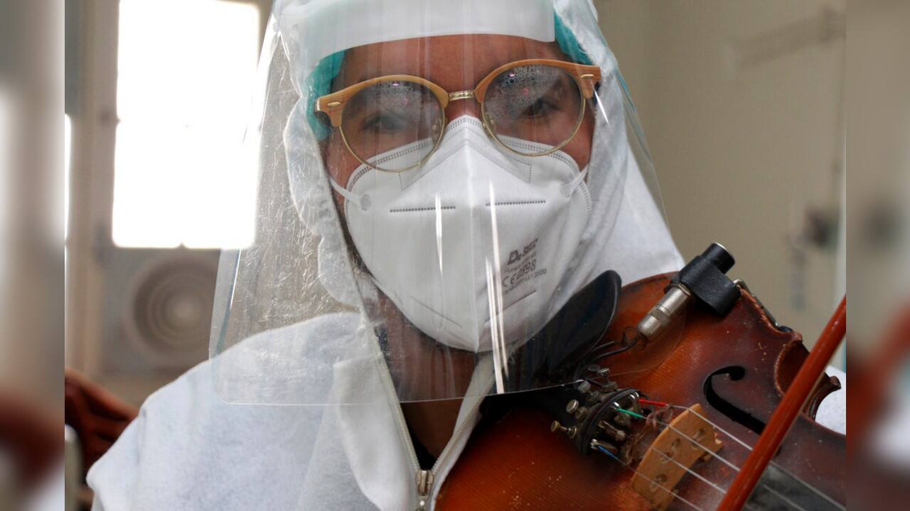 In the meantime, patients can rely on Siala to bring hope and resilience with the strokes of his bow. “He plays to entertain us a little bit almost every day. I pray to God to protect him, and I wish you all that God protect you from this disease,” said Brika Sdiri, clapping and smiling while listening to the music. “I hope to get out of this place in good health, that’s what I wish.&quot; (Image: AP)