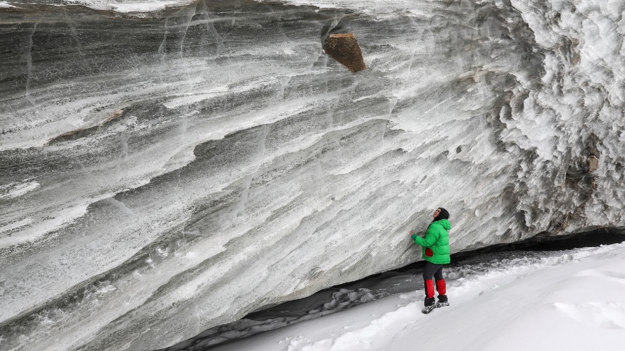 A tourist is seen on the Bogdanovich glacier located in the Tian Shan mountain range near Almaty, Kazakhstan February 20. (Image: Reuters)