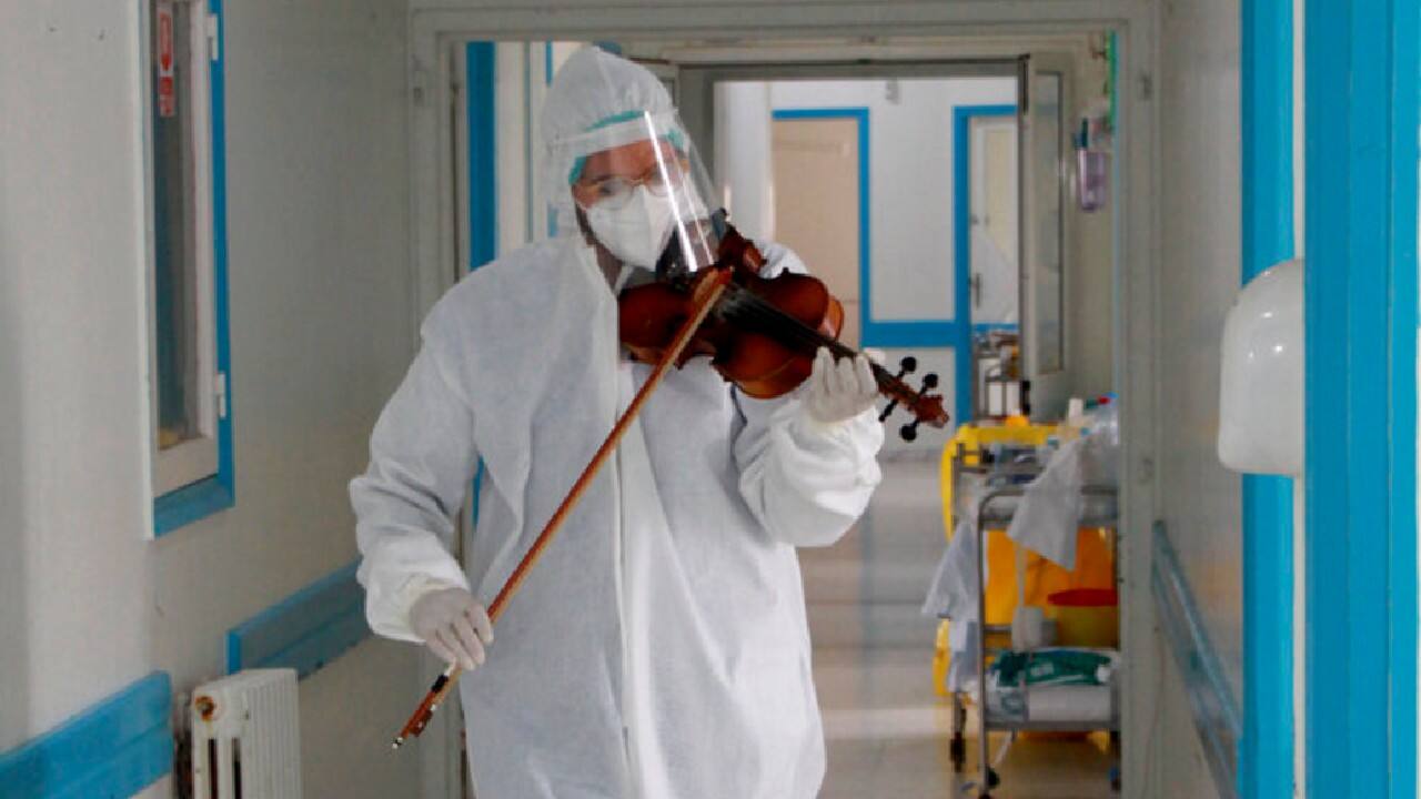 In his down time away from medical duties, Siala plays the violin enthusiastically and is also a member of a group called the “Pepper Band.&quot; “My goal is to use music to help treat coronavirus patients that are in a bad psychological condition, suffering loneliness — which is their first enemy,” Siala told The Associated Press. (Image: AP)