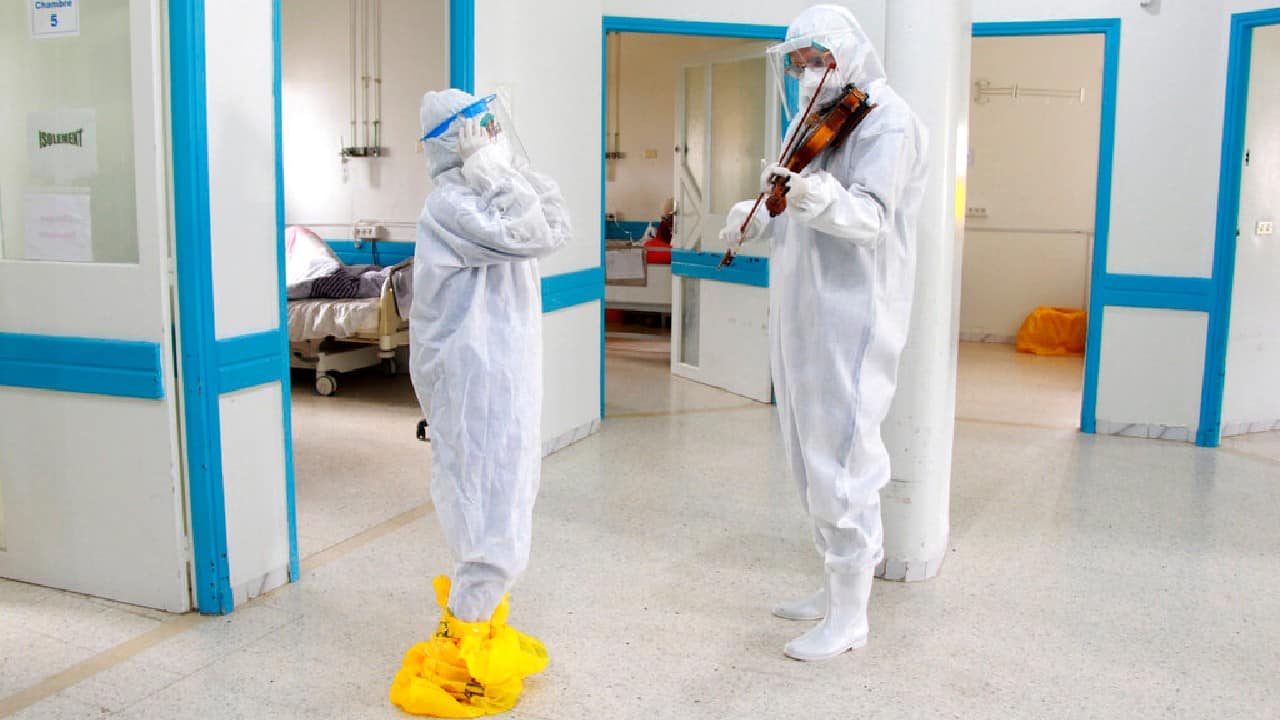 Siala now plays regularly in the hospital, when he has time. Walking through the corridors with his violin, Siala’s music helps not just the patients but also health workers. They have been under pressure in the last few months because of the increased number of virus-linked hospitalizations that spiked at the beginning of the year. (Image: AP)