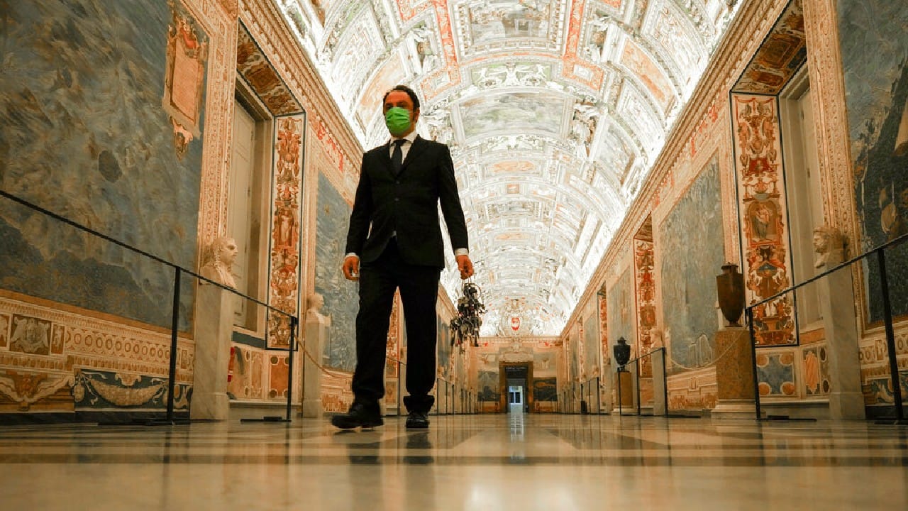 The Associated Press followed Crea on his rounds the first day the museum reopened to the public, joining him before dawn in the downstairs “bunker” where the 2,797 keys to the Vatican treasures are kept in wall safes overnight. As the keys dangled and jangled from giant keyrings he wears around his wrist, Crea wound his way through the Gallery of Maps, past the famed marble “Laocoön and His Sons" statue and finally to the Sistine Chapel. (Image: AP)