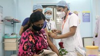 Is it safe to get vaccinated when you have COVID-19 symptoms? Doctors explain