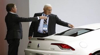 Henrik Fisker (right) looks over the 2016 Destino during the official launch of VLF Automotive at the North American International Auto Show in Detroit, on January 12, 2016.         REUTERS/Gary Cameron.