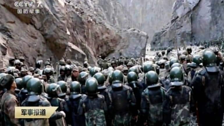 Indian and Chinese troops face off in the Galwan Valley on June 15, 2020. (Image: Footage from CCTV via AP Video)
