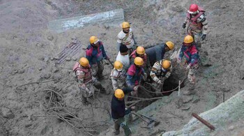 Indo Tibetan Border Police (ITBP) personnel digging to find the way to a tunnel near Chamoli's Tapovan in Uttarakhand to rescue the persons trapped after the flash floods. (Image: Twitter/@ITBP_official)