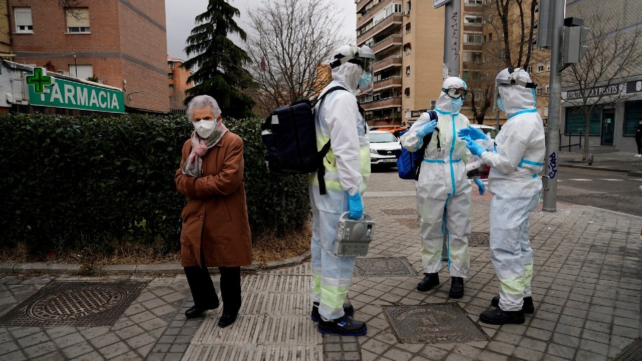Madrid Emergency Service (SUMMA) UVI-4 unit's Dr Gabriel Jesus Martinez-Villasenor, nurse Sara Diaz Castro and resident nurse Silvia Martin Martin wear Personal Protective Equipment (PPE) as they prepare to treat a patient inside his home during the coronavirus disease (COVID-19) outbreak in Madrid, Spain, February 3. &quot;I want to go out with my friends, I want to go to work and not have to wear protection. I want to see patients without a mask,&quot; said Diaz. (Image: Reuters)