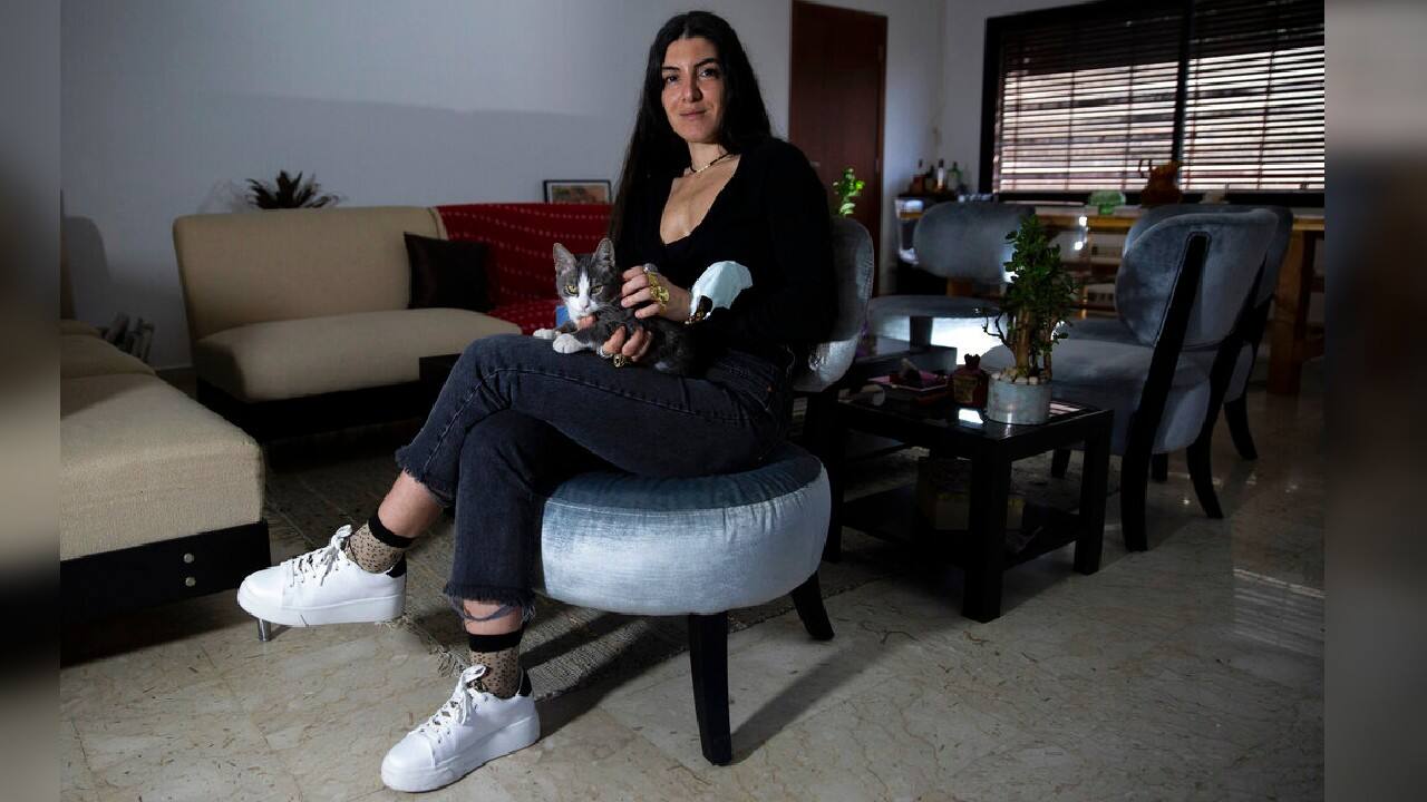 THE BLAST VICTIM | On August 4, Angelique Sabounjian was at a coffee shop in Beirut when a thunderous explosion at a warehouse containing a chemical commonly used as fertilizer rocked the city, blowing out windows and cutting Sabounjian's face. She bled profusely. On that day, she also became infected with the coronavirus. “Catching corona and being in that isolation really helped me realize I was crying all day, every day, and I think I needed that,” she said. “I needed to have that release in some way.” (Image: AP)