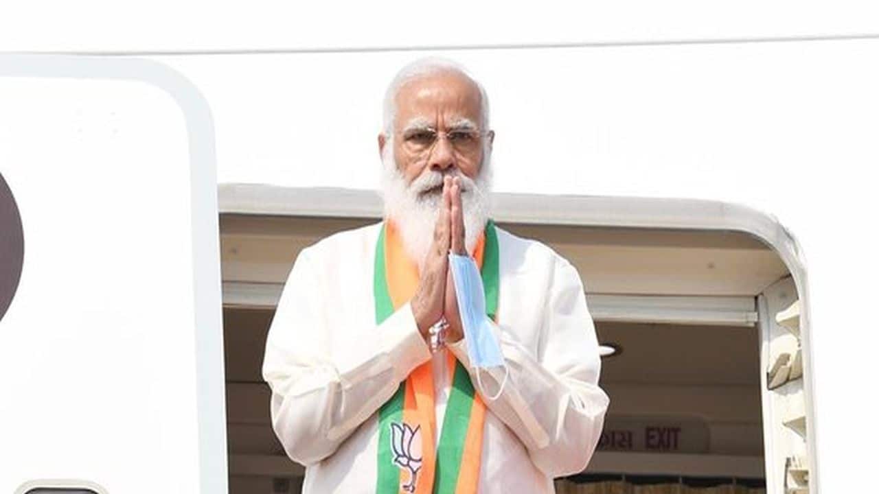 Prime Minister Narendra Modi arrived at the Kolkata airport to participate in BJP's mega rally. (ANI)