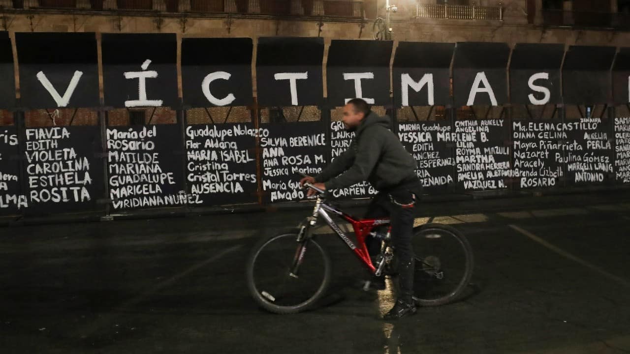 Near the front of the colonial-era building that serves as the president’s offices, activists wrote: “Victims of Femicide” in huge letters across the top of the barriers, with the names of many women scrawled underneath. (Image: Reuters)