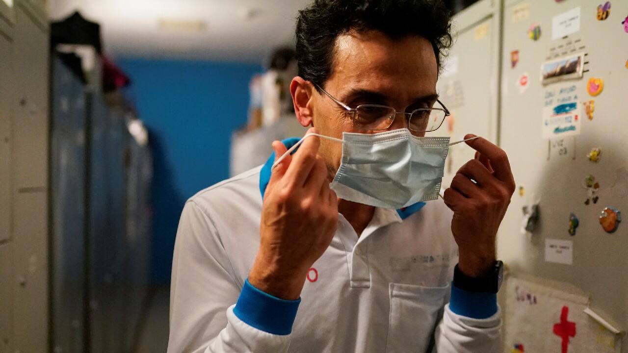 Madrid Emergency Service (SUMMA) UVI-3 unit's Dr Navid Behzadi Koochani prepares to respond to an emergency call during the coronavirus disease (COVID-19) outbreak in Madrid, Spain, March 2. &quot;I'm optimistic that in a few months we will be able to take off our masks again, hug each other and have a beer with our friends,&quot; said Behzadi. (Image: Reuters)