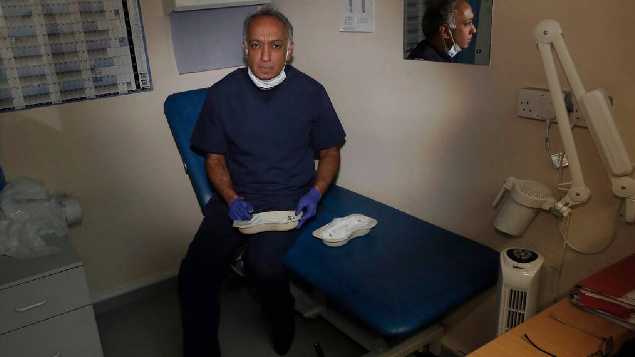 THE VACCINATOR | Dr. Anil Mehta has been going with his small team of physicians and nurses to homeless centers in London to offer free COVID-19 vaccinations. The team has vaccinated hundreds of people. “It makes sense to focus energy on groups that are underrepresented and those most reluctant to go to their doctors,” he said. Mehta is driven by a desire to help everyone get back to normal as quickly as possible. (Image: AP)