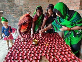 One woman from each of the 98 families of Chayanpurva is now engaged in making wax diyas.
