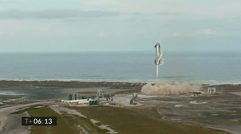 In this image from video grab made available by SpaceX, one of the company's Starship prototypes fires its thrusters as it lands during a test in Boca Chica, Texas on March 3, 2021. (Image: SpaceX via AP)