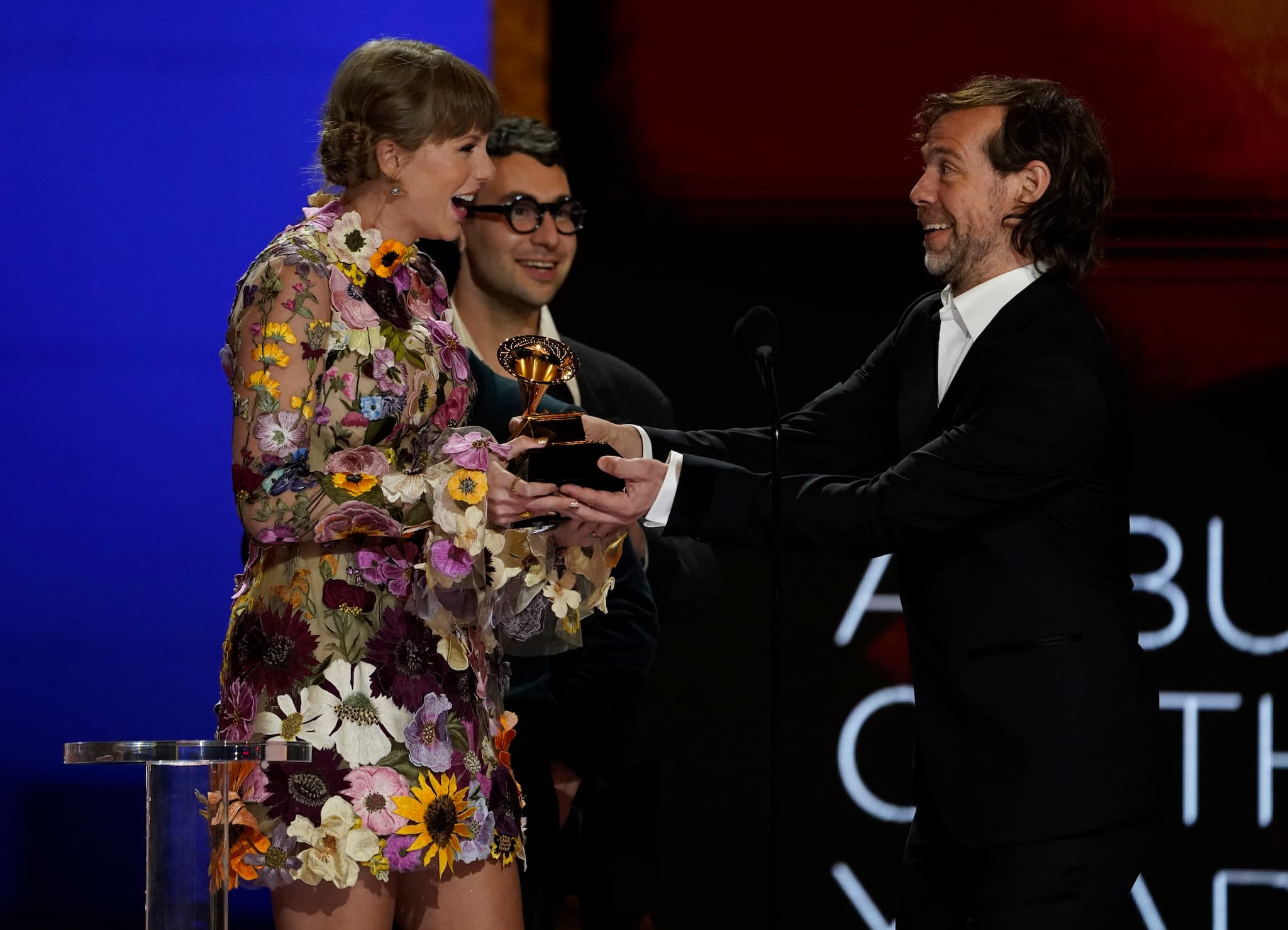 Taylor Swift, from left, Jack Antonoff and Aaron Dessner accept the award for album of the year for "Folklore"at the 63rd annual Grammy Awards at the Los Angeles Convention Center on Sunday, March 14, 2021. (AP Photo/Chris Pizzello)