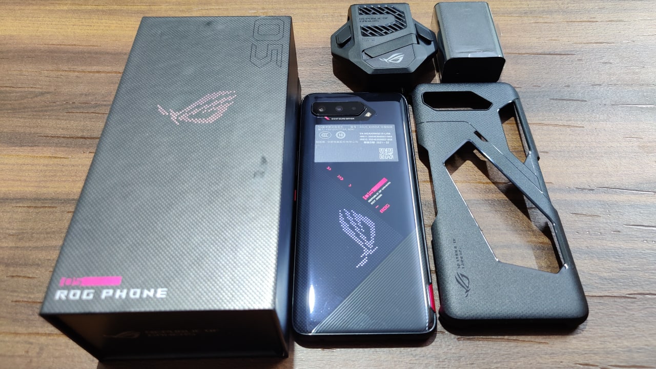 The build quality has also got an update, with Gorilla Glass Victus protection on the front and Gorilla Glass 3 on the front. The phone also features an aluminium frame, giving it a premium feel. Like previous ROG phones, the ROG 5 isn’t light and does seem to be a little on the slippery side. Thankfully, Asus has included an Aero case in the box, which maintains the futuristic aesthetic while providing an extra layer of protection. Asus has also bundled the AeroActive Cooler 5 with the ROG Phone 5. The build quality has also got an update, with Gorilla Glass Victus protection on the front and Gorilla Glass 3 on the front. The phone also features an aluminium frame, giving it a premium feel. Like previous ROG phones, the ROG 5 isn’t light and does seem to be a little on the slippery side. Thankfully, Asus has included an Aero case in the box, which maintains the futuristic aesthetic while providing an extra layer of protection. Asus has also bundled the AeroActive Cooler 5 with the ROG Phone 5.